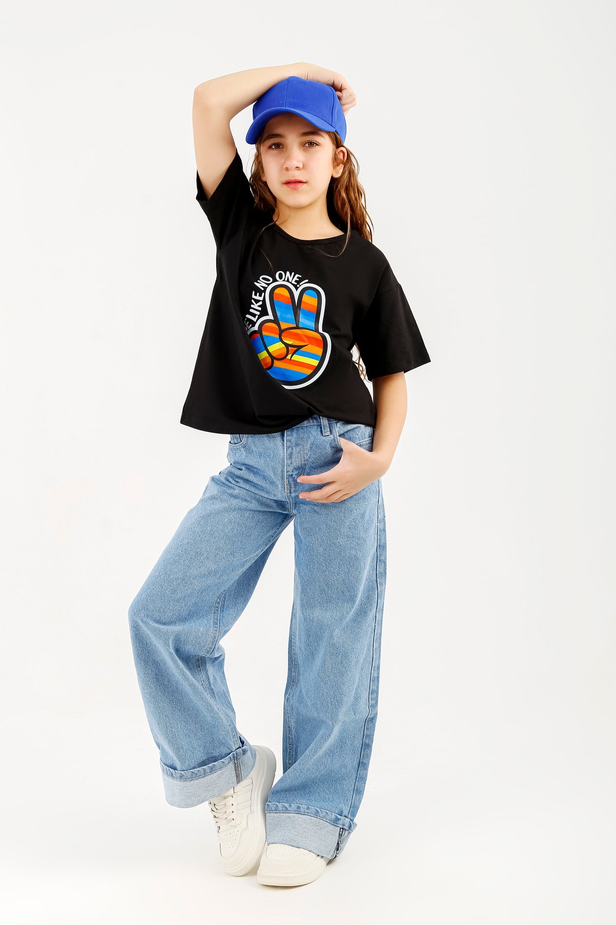  Black children's t-shirt with a colorful peace sign print